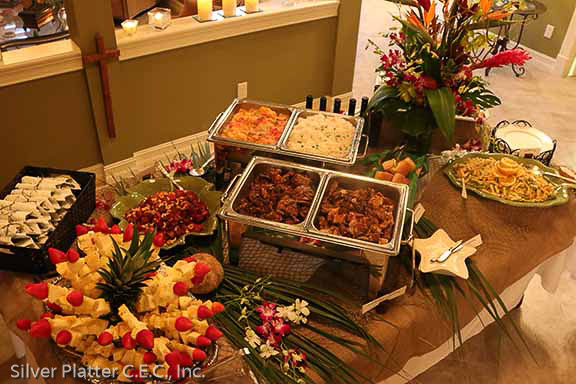 A tropical buffet arranged by Luz for a Silver Platter luau